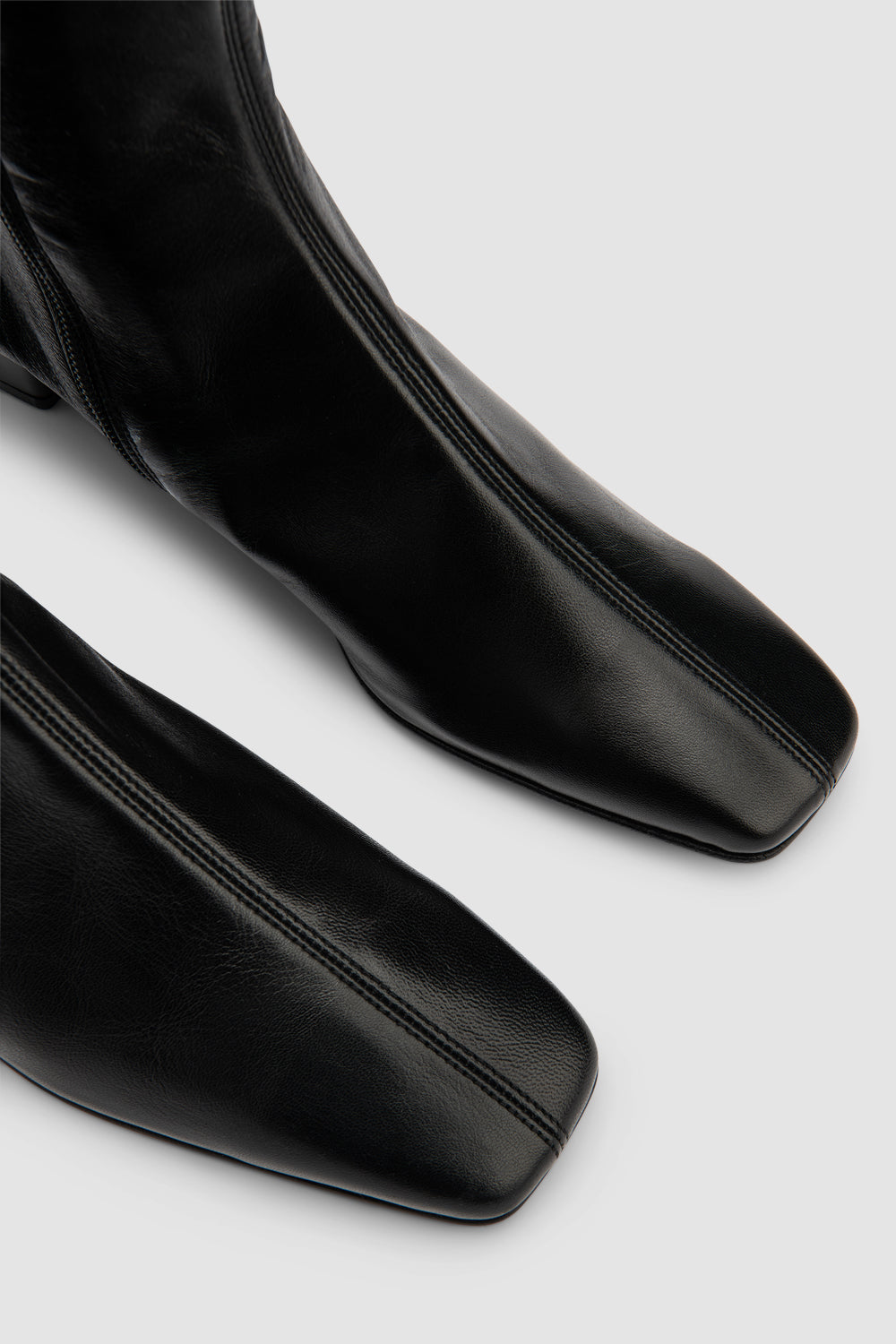 Edie Black Leather Knee-High Boot