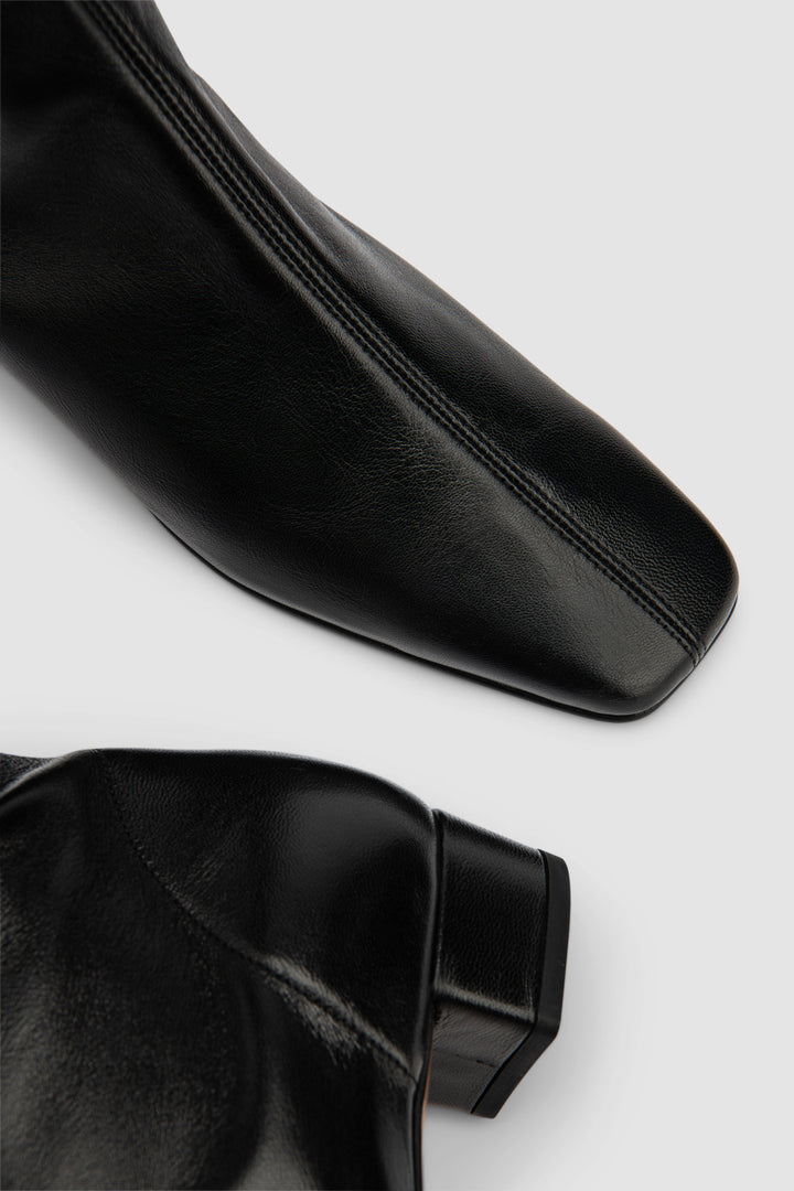 Edie Black Leather Knee-High Boot